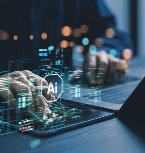 Humans are using laptops and computers to interact with AI, helping them create, code, train AI, or analyze big data with fast, cutting-edge  technology.